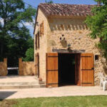 A picturesque stone house in Saint-Avit-Sénieur, offering a delightful Airbnb experience.